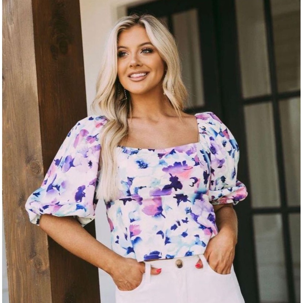 These three boutique floral print puff sleeve top